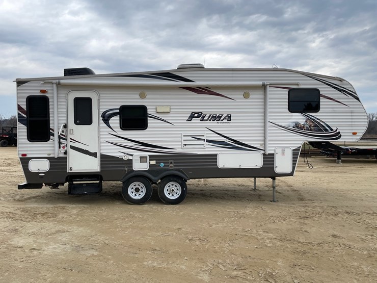 #201-•-2014-palomino-puma-253-fbs-27'-fifth-wheel-camper-(has-wi-title)-image-2