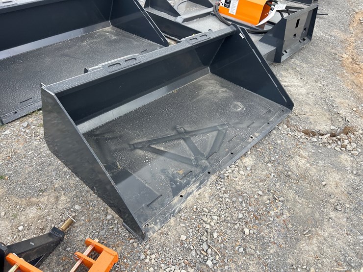 #83-•-unused-66”-skid-steer-smooth-bucket-image-1