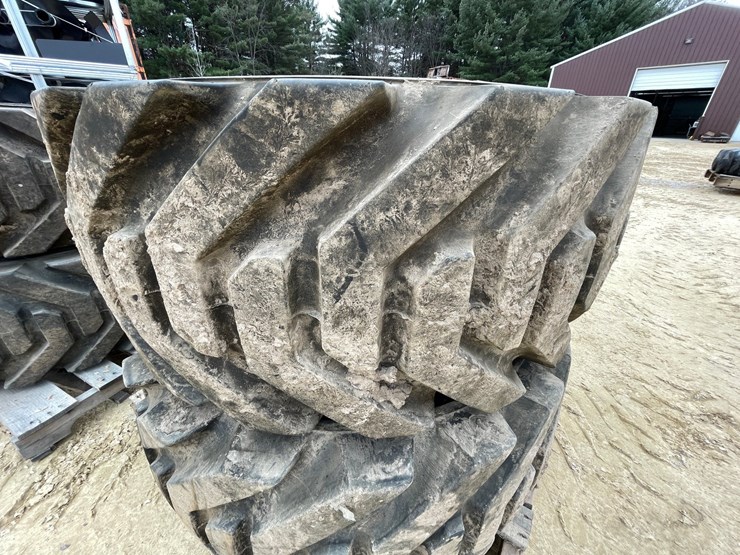 #7540-•-set-of-(4)-outrigger-brand-boom-lift-tires-on-rims-image-21