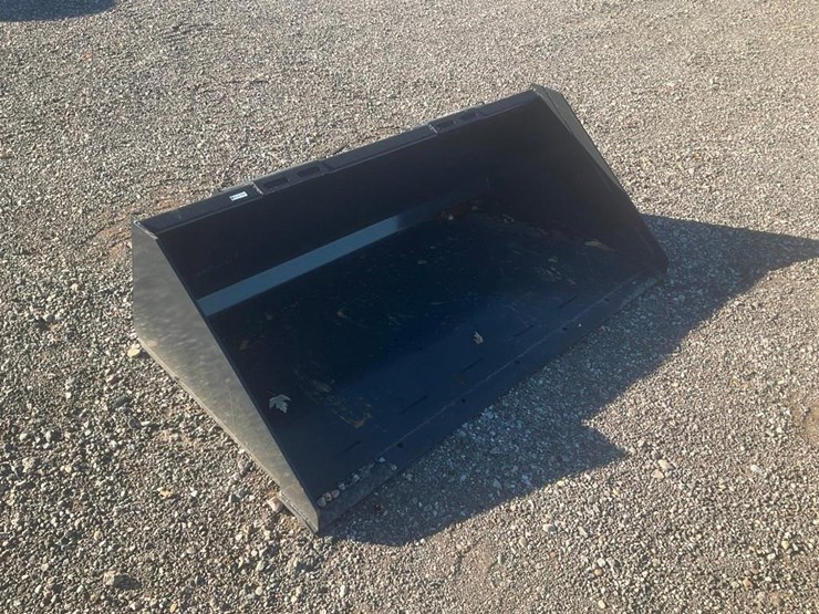 #1407-•-unused-wolverine-skid-steer-track-duty-bucket-attachment-image-1