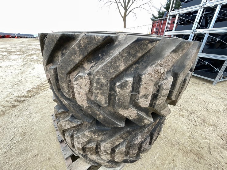 #7540-•-set-of-(4)-outrigger-brand-boom-lift-tires-on-rims-image-20