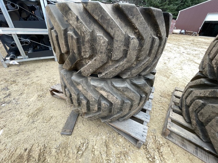 #7540-•-set-of-(4)-outrigger-brand-boom-lift-tires-on-rims-image-3