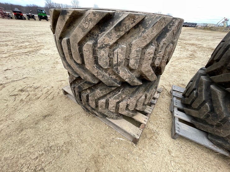 #7540-•-set-of-(4)-outrigger-brand-boom-lift-tires-on-rims-image-15