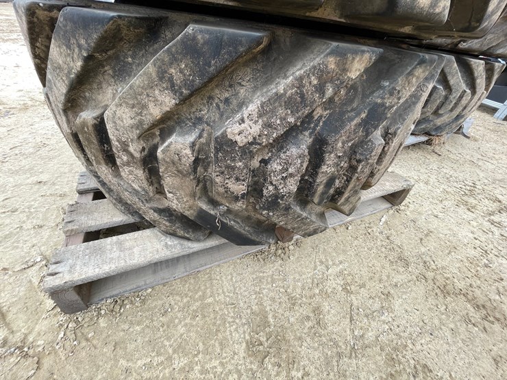 #7540-•-set-of-(4)-outrigger-brand-boom-lift-tires-on-rims-image-23