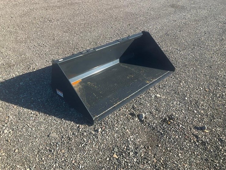 #1410-•-unused-wolverine-skid-steer-track-duty-bucket-attachment-image-1