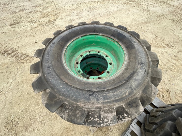 #7540-•-set-of-(4)-outrigger-brand-boom-lift-tires-on-rims-image-16