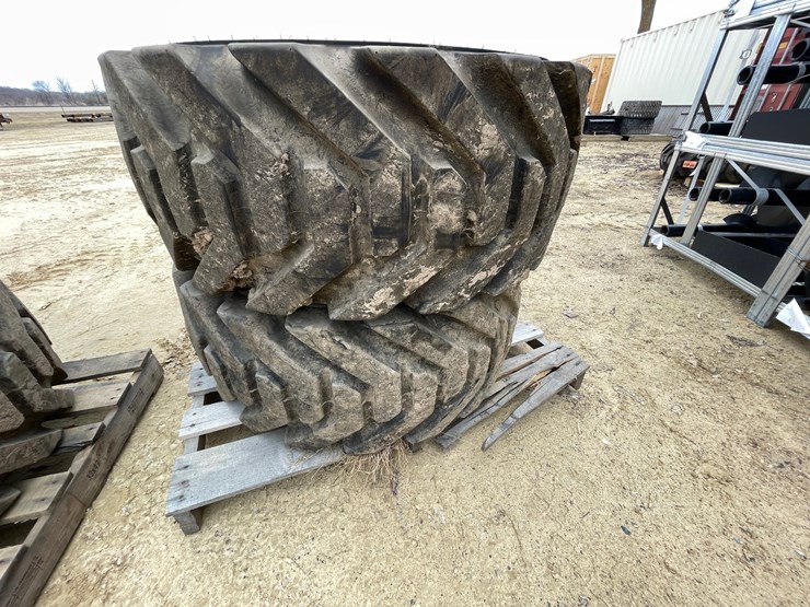 #7540-•-set-of-(4)-outrigger-brand-boom-lift-tires-on-rims-image-5