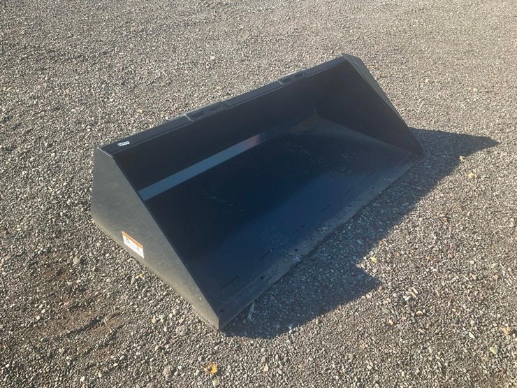 #1413-•-unused-wolverine-skid-steer-track-duty-bucket-attachment-image-1