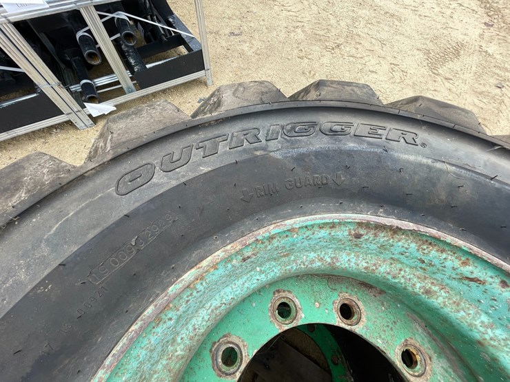 #7540-•-set-of-(4)-outrigger-brand-boom-lift-tires-on-rims-image-9