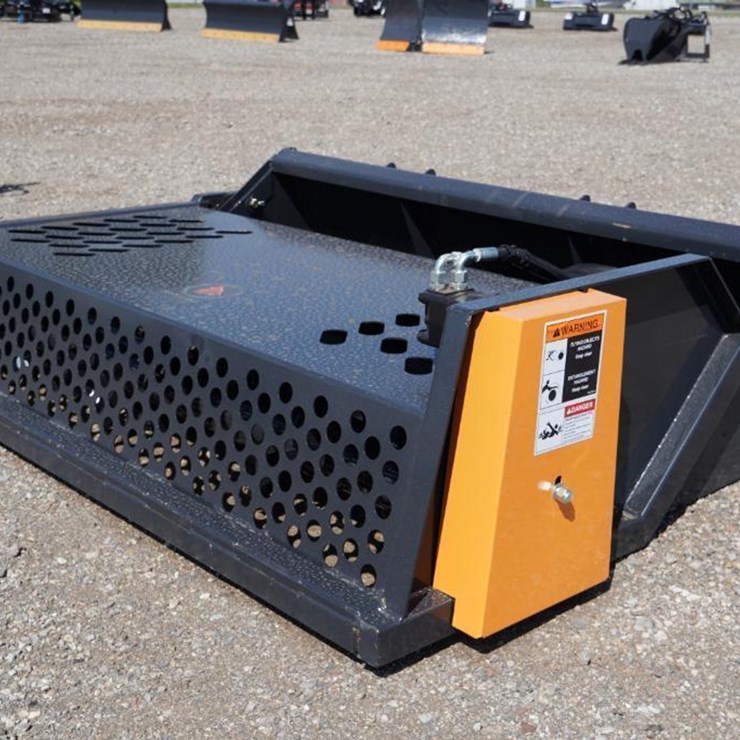 #1438 • New Skid Steer Wolverine Rock Rake Attachment