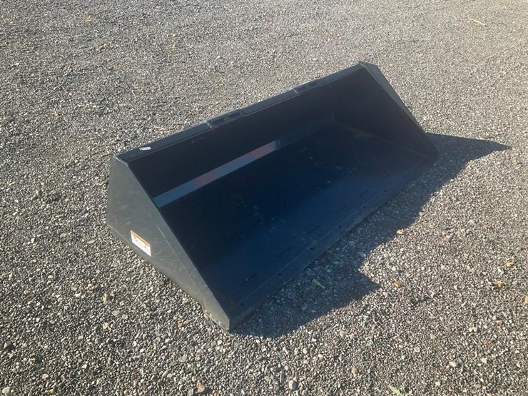 #1417-•-unused-wolverine-skid-steer-track-duty-bucket-attachment-image-1