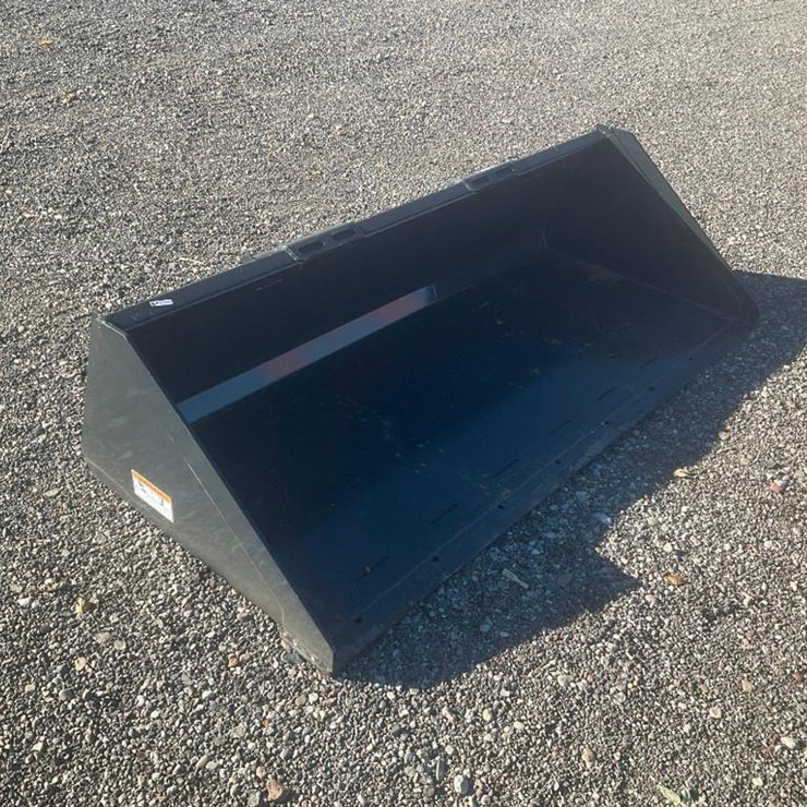 #1417 • Unused Wolverine Skid Steer Track Duty Bucket Attachment
