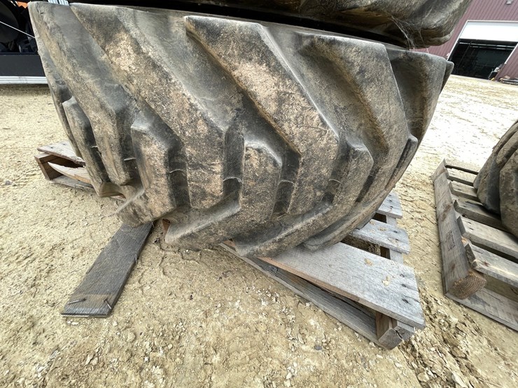 #7540-•-set-of-(4)-outrigger-brand-boom-lift-tires-on-rims-image-12