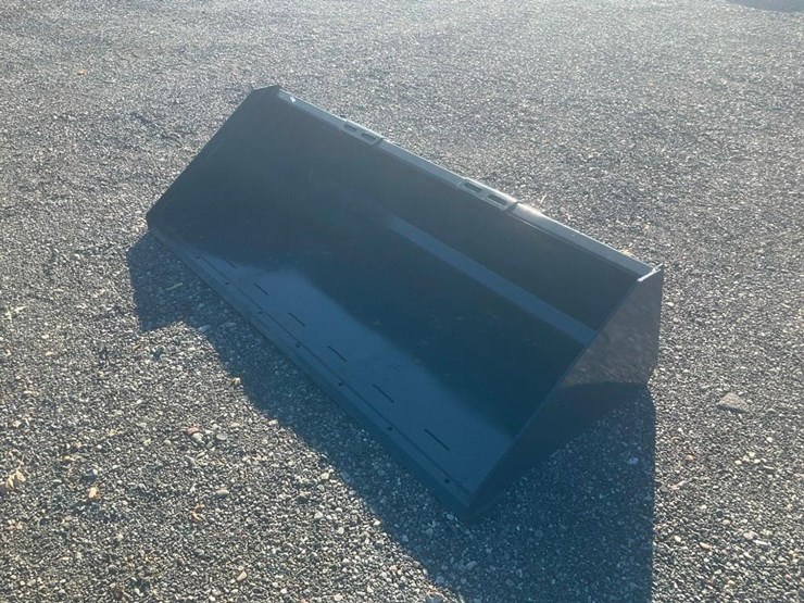 #1417-•-unused-wolverine-skid-steer-track-duty-bucket-attachment-image-2