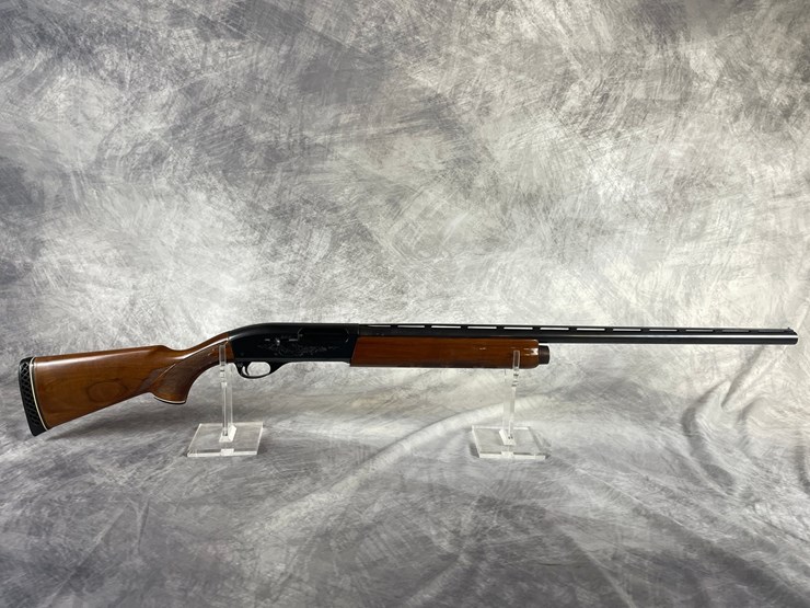 #3134-•-remington-model-1100-12-ga.-semi-automatic-shotgun-sn:-m053220v-(downing,-wi)-image-1