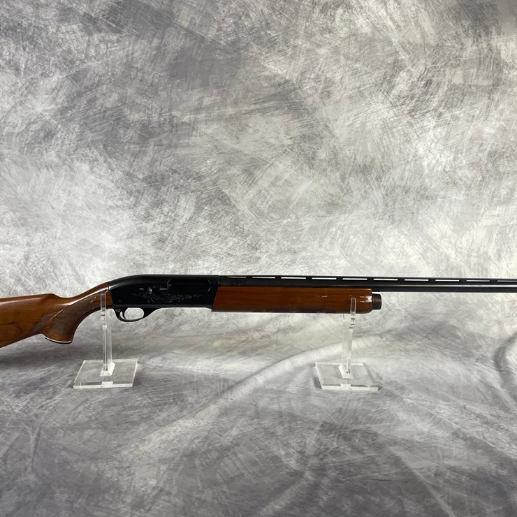 #3134 • Remington Model 1100 12 Ga. Semi Automatic Shotgun SN: M053220V (Downing, WI)