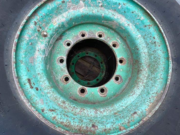 #7540-•-set-of-(4)-outrigger-brand-boom-lift-tires-on-rims-image-7