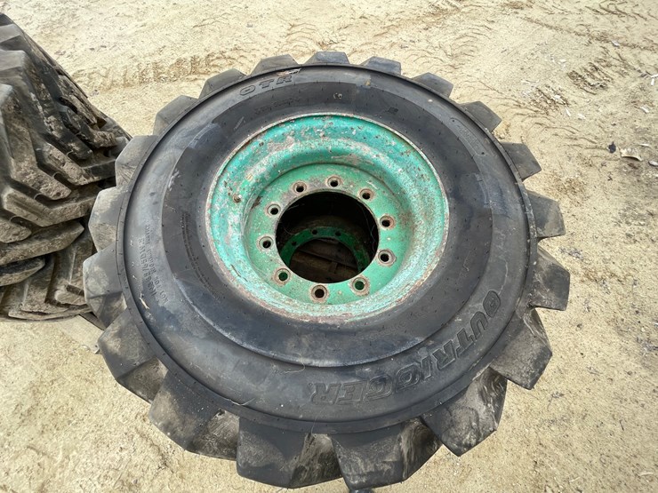 #7540-•-set-of-(4)-outrigger-brand-boom-lift-tires-on-rims-image-6