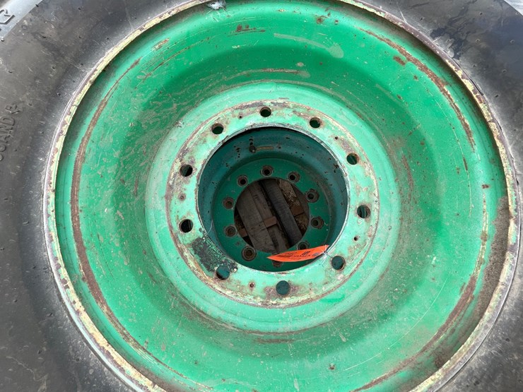 #7540-•-set-of-(4)-outrigger-brand-boom-lift-tires-on-rims-image-17