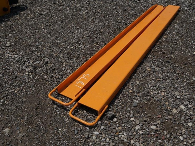 #1436-•-unused-wolverine-skid-steer-pallet-forks-extensions-image-1