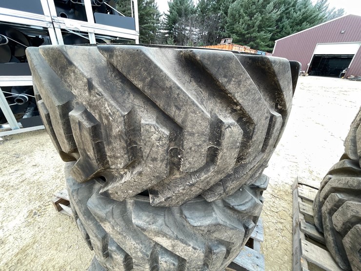 #7540-•-set-of-(4)-outrigger-brand-boom-lift-tires-on-rims-image-11