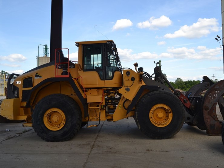 volvo-180h-articulating-wheel-loader-w/-enclosed-cab-w/-heat-&-air-w/-log-forks-w/-double-hold-down-w/-26.5xr25-rub-sn#vcel180hv00004828-image-1