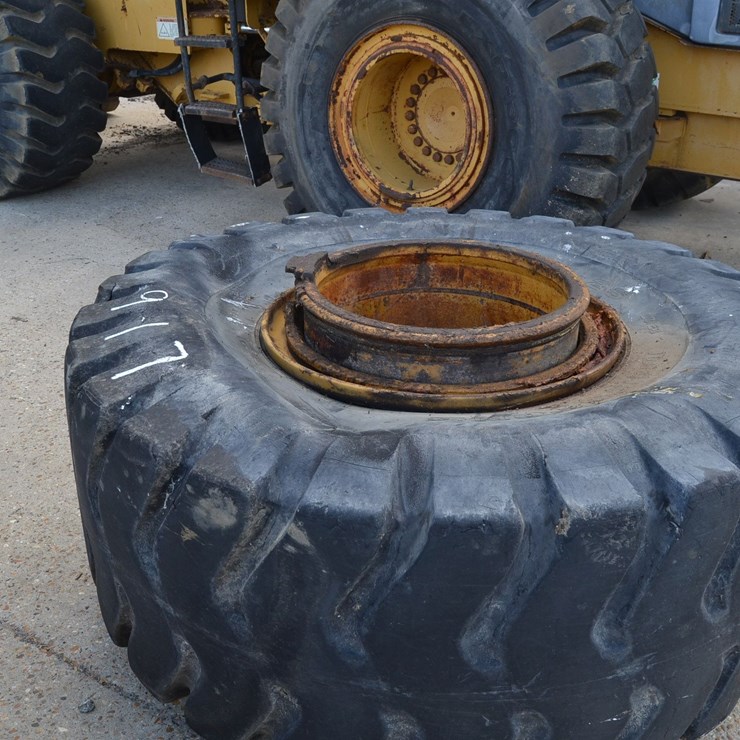 (2) USED 26.5R25 ON CAT WHEELS