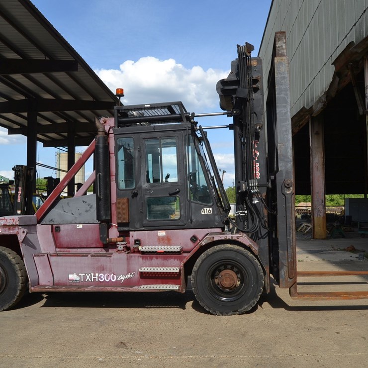 TAYLOR MODEL TXH300L DUAL WHEEL FORKLIFT W/ SIDE SHIFT W/ FORK POSITIONER W/ CUMMINS ENGINE W/ ENCLOSED CAB SN#SCH37995  33,641 HOURS
