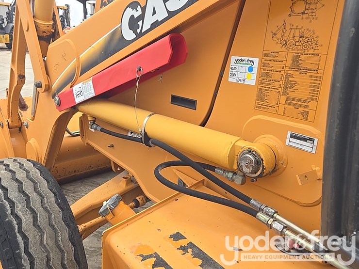 2004-case-580m-image-26