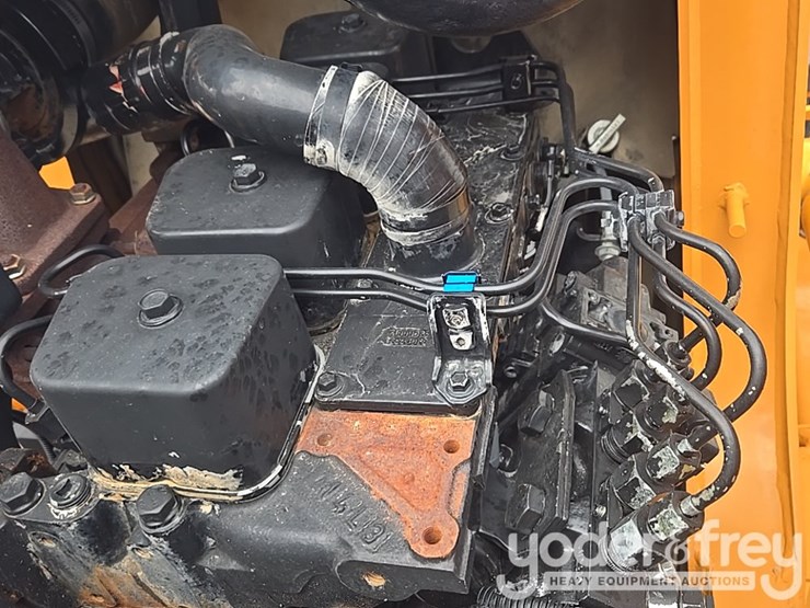 2004-case-580m-image-59