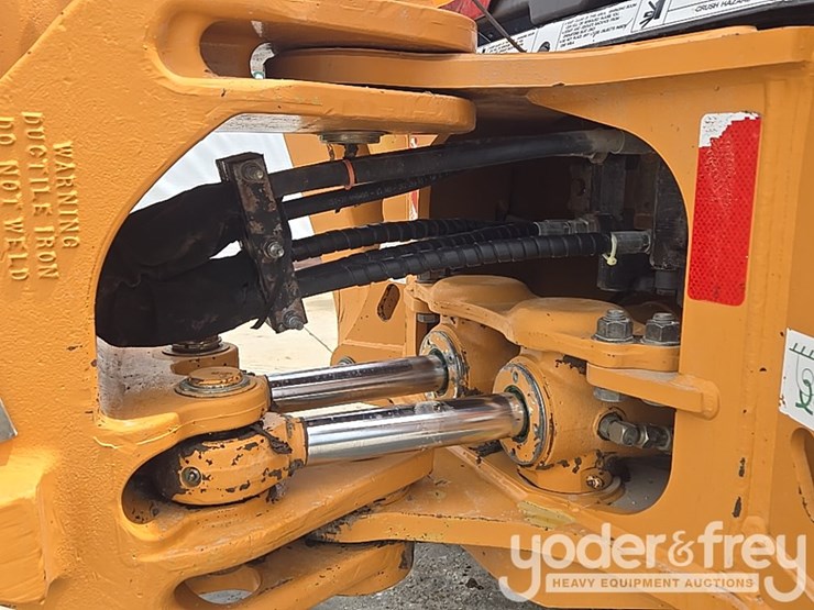 2004-case-580m-image-40