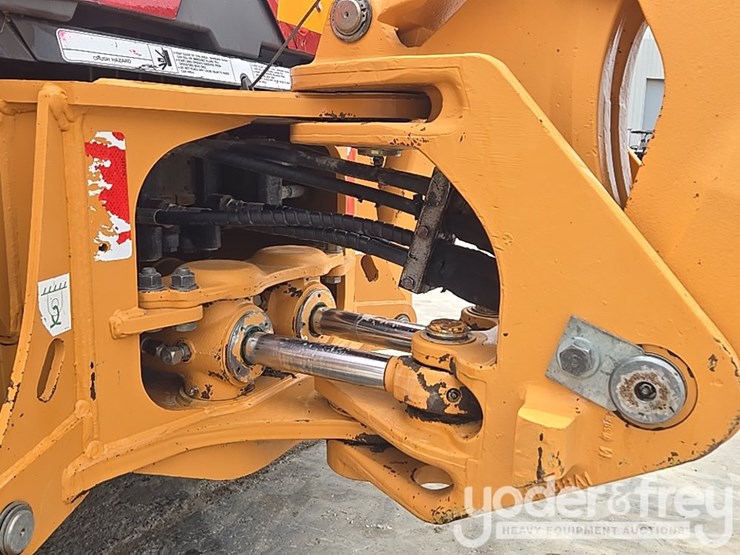 2004-case-580m-image-35