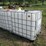 #45965-•-lot-of-(2)-250gal-plastic-tote-w/-cages-image-1