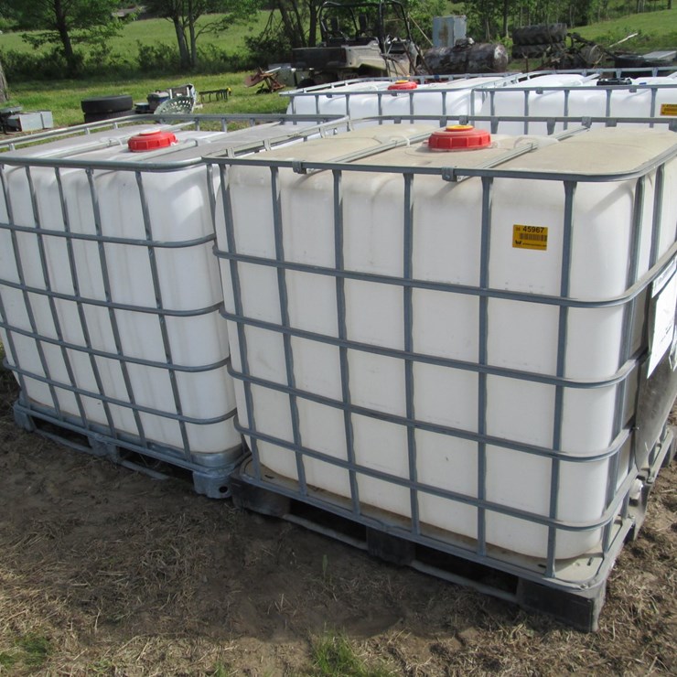 #45967 • Lot of (2) 250gal Plastic Tote w/ Cages