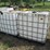 #45966-•-lot-of-(2)-250gal-plastic-tote-w/-cages-image-1