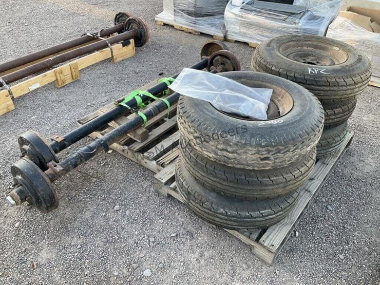 (2)-5-lug-trailer-axles-w/-(6)-tires-&-wheels-image-1