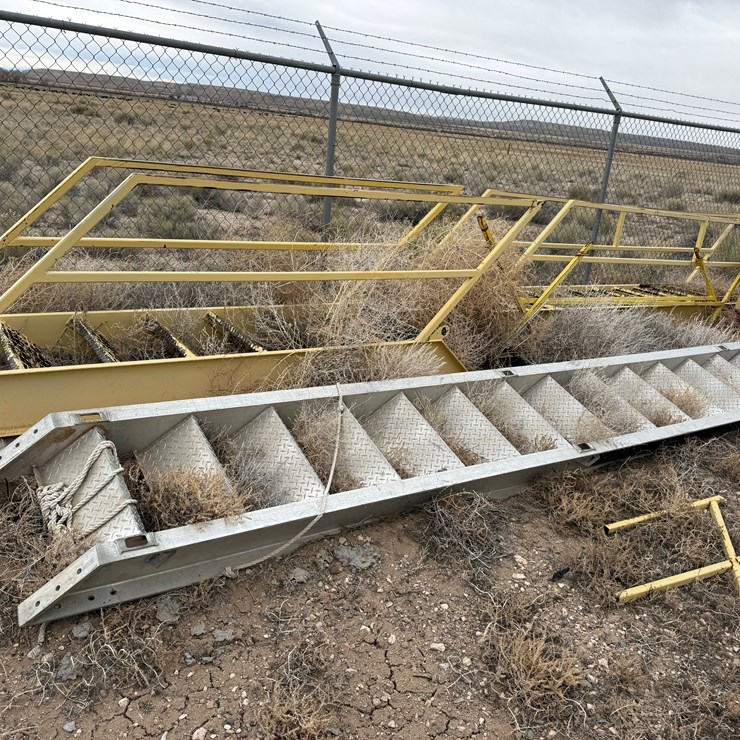 (1) 12' EXTENDABLE ALUMINUM, (1) 15' ALUMINUM, & (2) 15' STEEL W/ HAND RAILS RIG LADDERS