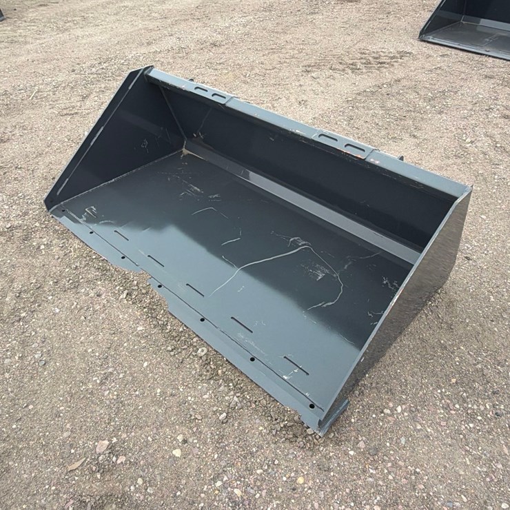 Unused 2025 Wolverine TDB-11-66W Skid Steer Track Duty Bucket Attachments
