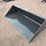 unused-2025-wolverine-tdb-11-84w-skid-steer-track-duty-bucket-attachment-image-1