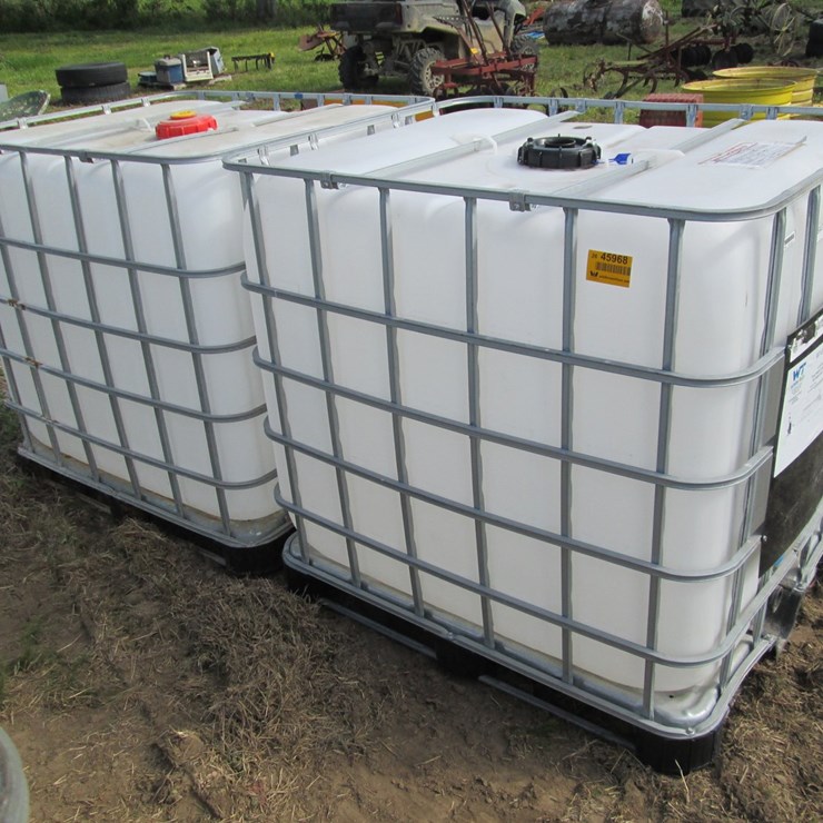 #45968 • Lot of (2) 260gal Plastic Tote w/ Cages