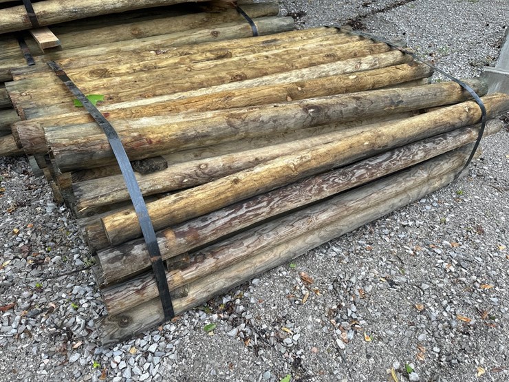 #1414-•-bundle-of-green-river-pressure-treated-post-image-1