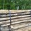 #1416-•-bundle-of-green-river-pressure-treated-post-image-1