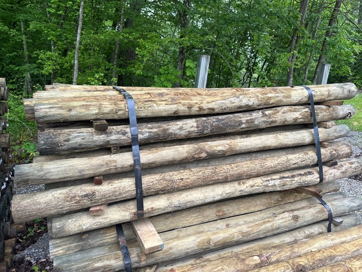 #1416-•-bundle-of-green-river-pressure-treated-post-image-1