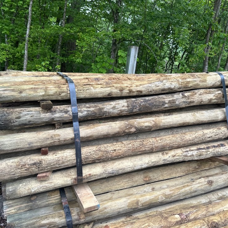 #1416 • Bundle of green river pressure treated post
