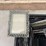 milk-crate-containing-a-multitude-of-metal-frame-picture-frames-image-4