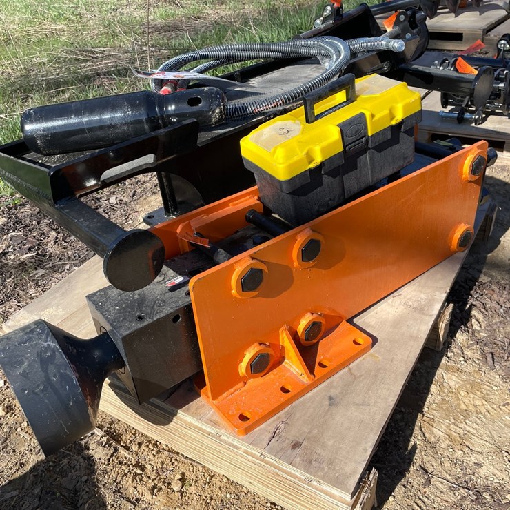 #2327 • New Wolverine Skid Steer Post Driver Attachment