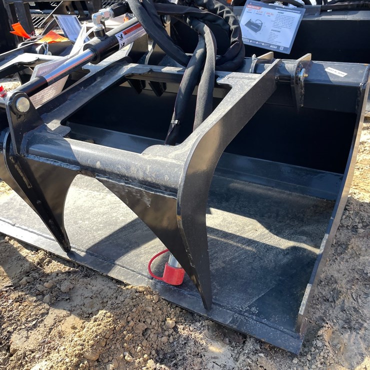 #2319 • New Wolverine Mini Skid Steer Stump Grapple Attachment