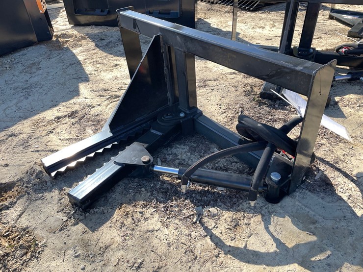#2322-•-new-wolverine-skid-steer-tree-puller-image-1