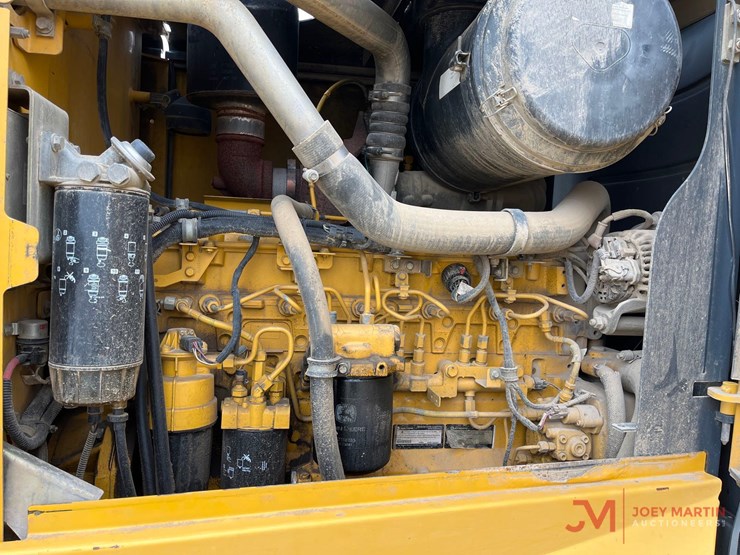 2010-deere-670g-image-14