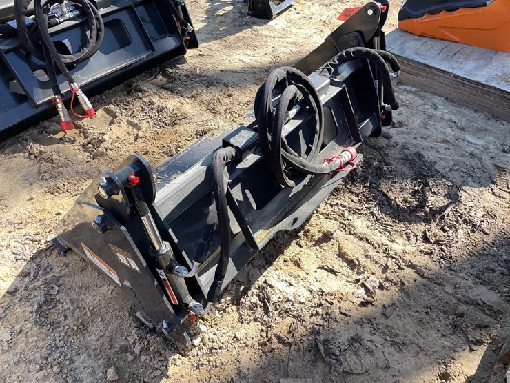#2317-•-new-wolverine-mini-skid-steer-combination-bucket-image-5